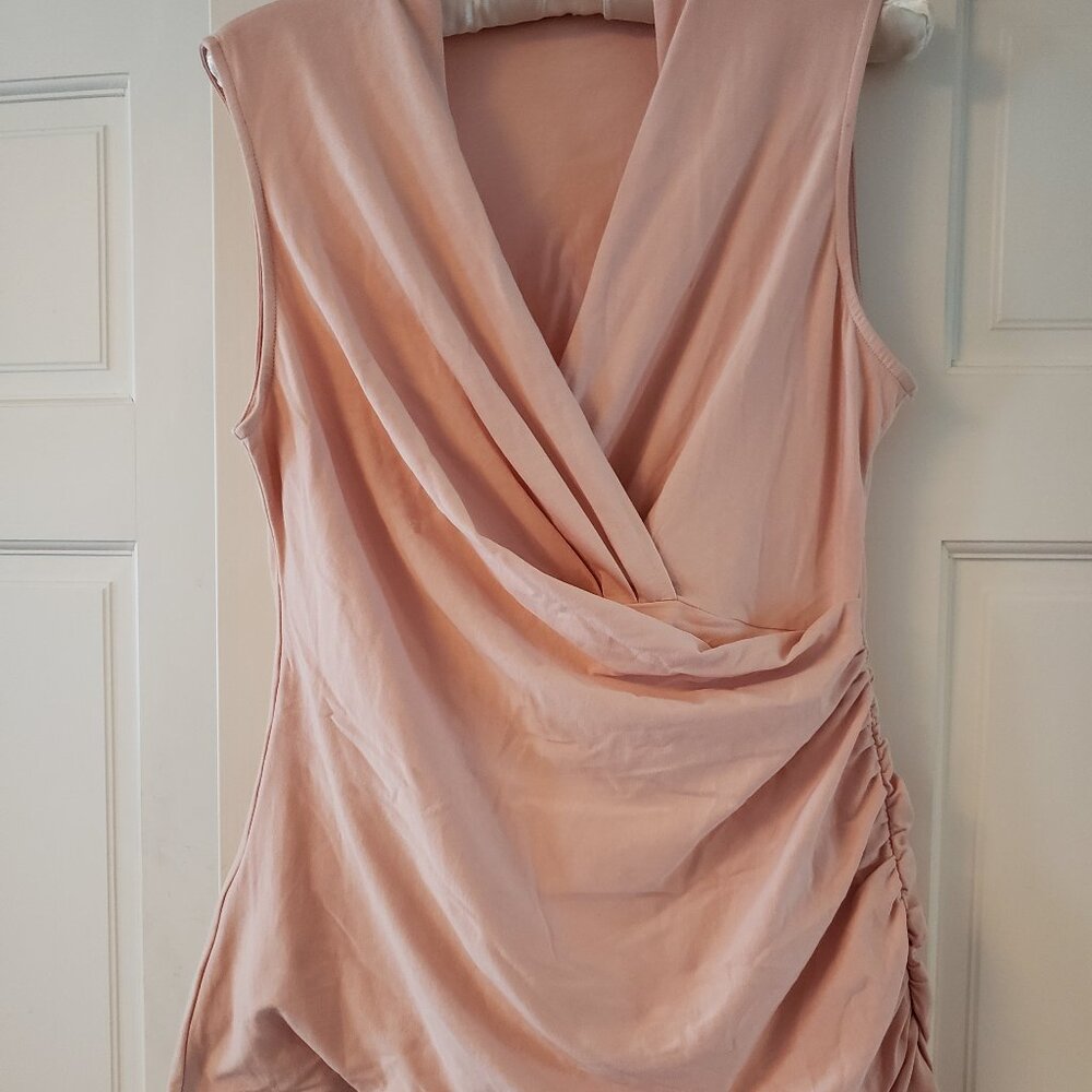 Pink surplice sleeveless top